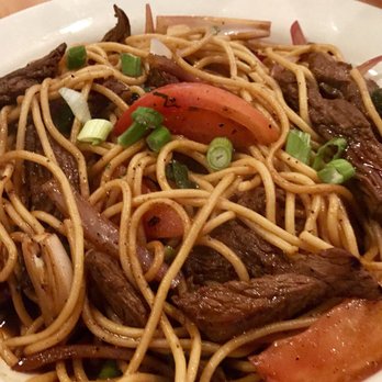 Happy Fish - Tallarin saltado (beef noodle stir fry) - Peruvian Near Me - Tampa, Florida Happy Fish - Tallarin saltado (beef noodle stir fry) - Peruvian Near Me - Tampa, Florida