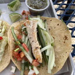 Fish taco, with tiny strip of "fish" and mostly cucumber. Fish taco, with tiny strip of "fish" and mostly cucumber.