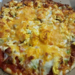 Pizza Planet - Breakfast pizza.  They forgot the side of salsa.  :( very interesting pizza though. In this case interesting equals good.