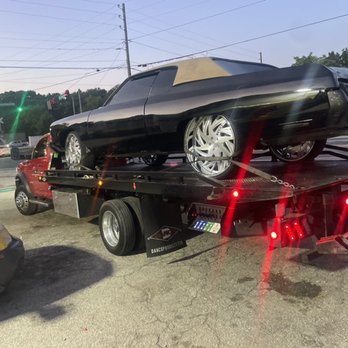 Mitchell's Professional Towing - Donk on 28s - Towing Near Me Mitchell's Professional Towing - Donk on 28s - Towing Near Me
