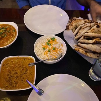 Flames Indian Aroma - a variety of dishes of food - Indian Near Me - New York, New York Flames Indian Aroma - a variety of dishes of food - Indian Near Me - New York, New York