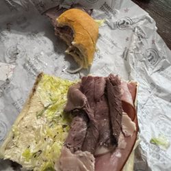 Jimmy John's - Bottom half of my half Giant Gargantuan.   Just meats a thin slice of cheese , lettuce, dressing, and mayo.