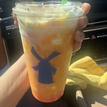Dutch Bros Coffee - Mango smoothie parfait with soft top and strawberry fruit float? - Coffee & Tea Near Me - Tucson, Arizona Dutch Bros Coffee - Mango smoothie parfait with soft top and strawberry fruit float? - Coffee & Tea Near Me - Tucson, Arizona