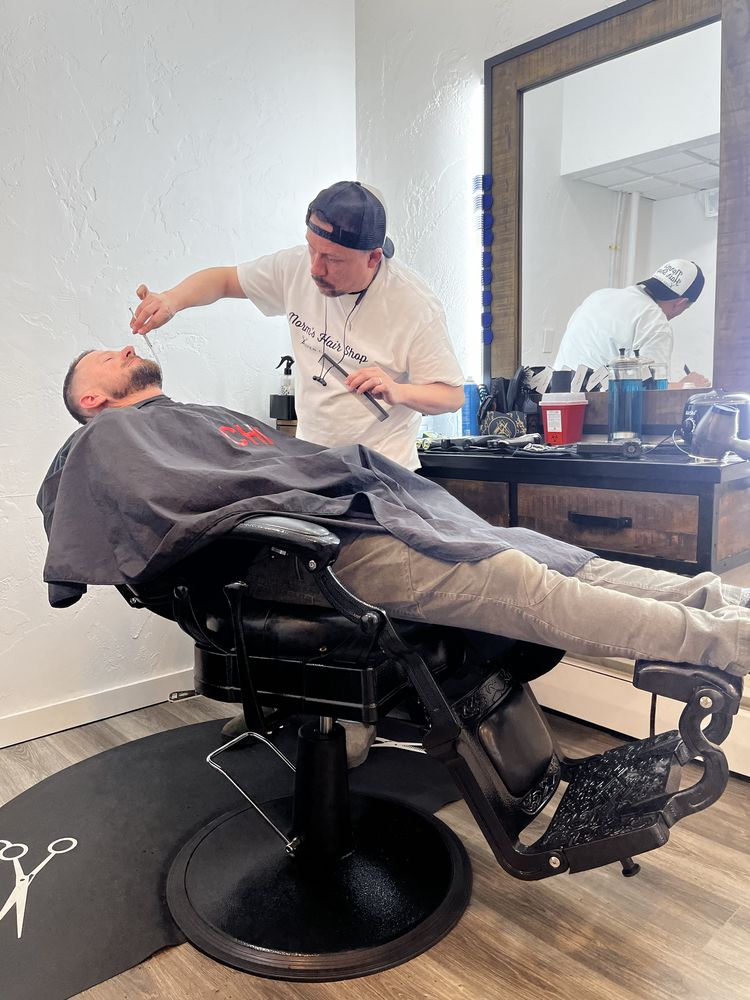 Norm’s Hair Shop Logo