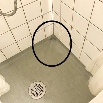 Shower Floor Uneven Poorly Maintained Yelp