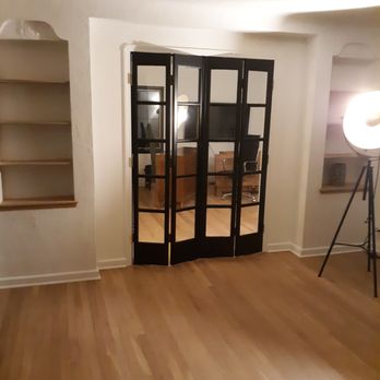 KYCO Painting - a living room with hardwood floors - Painters Near Me - Euclid, Ohio KYCO Painting - a living room with hardwood floors - Painters Near Me - Euclid, Ohio