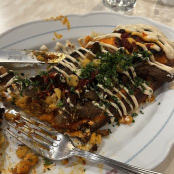 Cafe Landwer - Burnt vegan shawarma on burnt tough focaccia bread. - Mediterranean Near Me - Boston, Massachusetts Cafe Landwer - Burnt vegan shawarma on burnt tough focaccia bread. - Mediterranean Near Me - Boston, Massachusetts