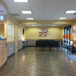 FastMed Urgent Care - Vacant waiting area and parking lot.