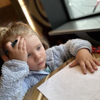 Eye Tooth - My toddler stressing about coloring. They have crayons and paper for the kids! (No Kids Menu) - Pizza Near Me - Anchorage, Alaska