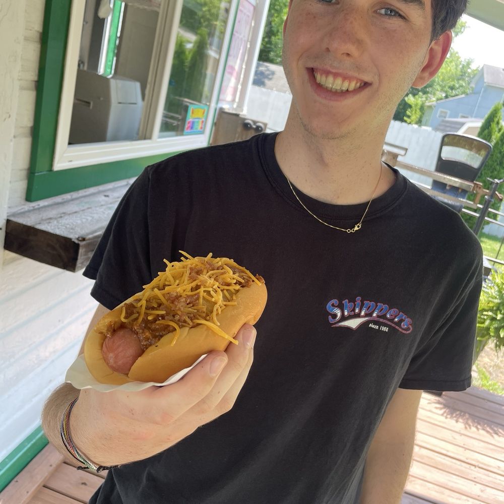 Sailor’s Landing - The 'Vermilion' hot dog. All beef dog, chili, cheese, fries, and bacon bits. - Shaved Ice Near Me - Vermilion, Ohio Sailor’s Landing - The 'Vermilion' hot dog. All beef dog, chili, cheese, fries, and bacon bits. - Shaved Ice Near Me - Vermilion, Ohio