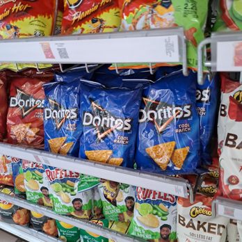 Shell - a shelf of chips and other snacks - Car Wash Near Me - Dallas, Texas