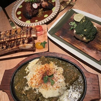 VERDAD True Modern Mexican - Pork Enchiladas with Salsa Verde, Cedar Plank Roasted Hamachi Verde, Cherry Mole Duck, Roasted Bone Marrow Canoes - Mexican Near Me - Austin, Texas VERDAD True Modern Mexican - Pork Enchiladas with Salsa Verde, Cedar Plank Roasted Hamachi Verde, Cherry Mole Duck, Roasted Bone Marrow Canoes - Mexican Near Me - Austin, Texas