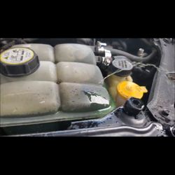 Bill's Auto Repair & Tire - Got my car back with a hole in my coolant tank leaking coolant and overheating my car!