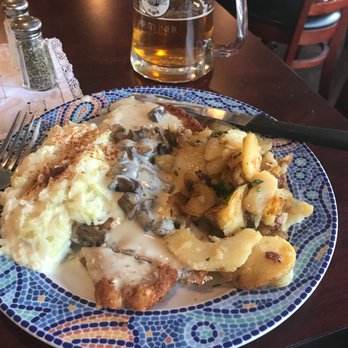 Haus Murphy's - Delicious chicken schnitzel with lovely creamed cabbage and roasted potatoes. - German Near Me - Glendale, Arizona Haus Murphy's - Delicious chicken schnitzel with lovely creamed cabbage and roasted potatoes. - German Near Me - Glendale, Arizona
