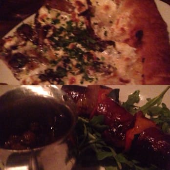 Siena Tavern - Truffle pizza.  Sausage and bacon appetizer - Italian Near Me - Chicago, Illinois