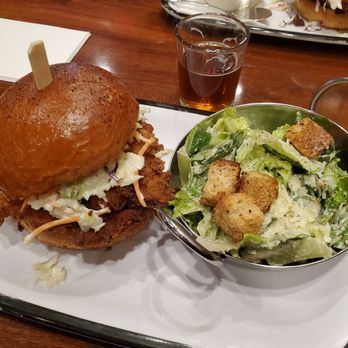 Great Basin Brewing Co. - Reno - Hot fried chicken sandwich with Ceasar salad and pumpkin beer - Pizza Near Me - Reno, Nevada Great Basin Brewing Co. - Reno - Hot fried chicken sandwich with Ceasar salad and pumpkin beer - Pizza Near Me - Reno, Nevada