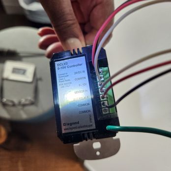 Thomas Electrical - Checking wires for lose connection. - Electricians Near Me