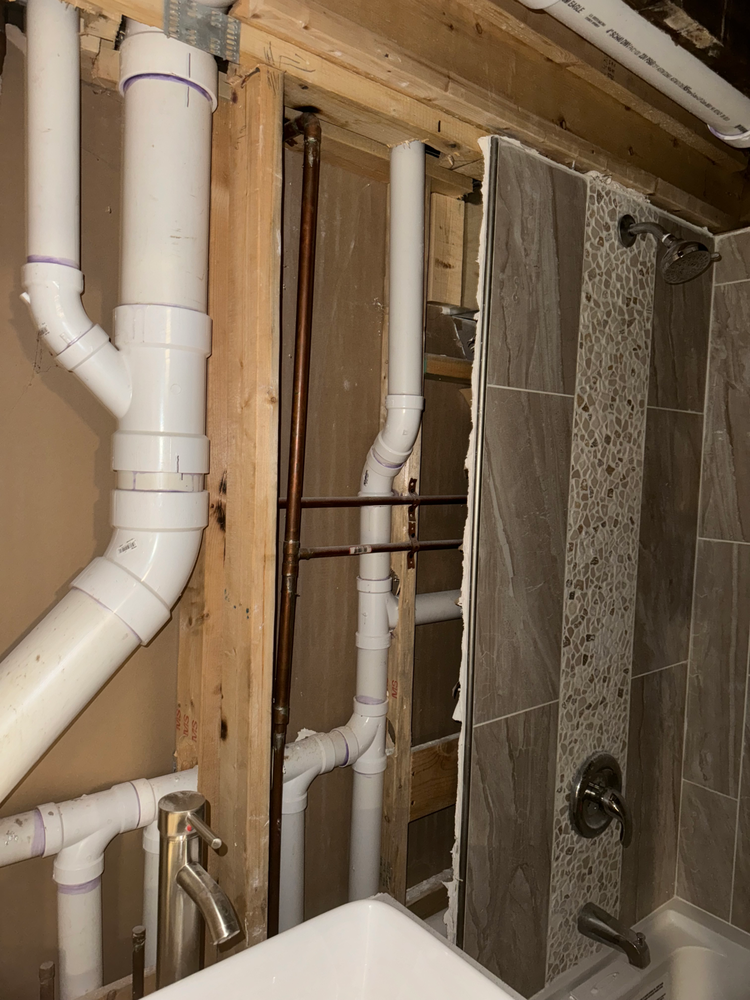 Slide of Suburban Plumbing Experts