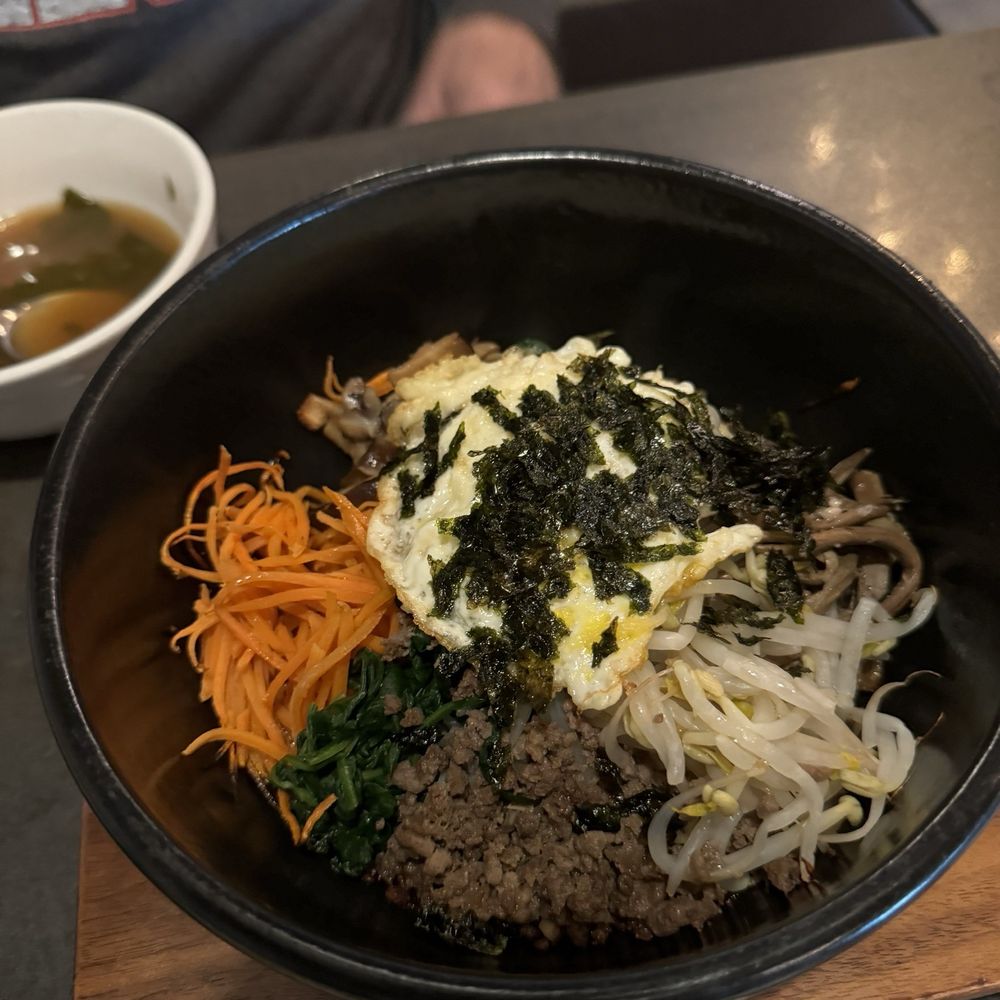 Korean Garden - Hot pot bimbimbap with side of soup - Korean Near Me - Suwanee, Georgia