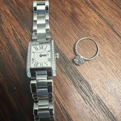 Repaired ring and watch that had link removed from
