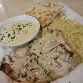 Malibu Eatery - Grilled Fish Plate (tilapia with garlic butter seasoning) with rice pilaf and hummus. - Seafood Near Me - Redondo Beach, California Malibu Eatery - Grilled Fish Plate (tilapia with garlic butter seasoning) with rice pilaf and hummus. - Seafood Near Me - Redondo Beach, California