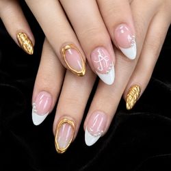 Pure Nails Spa - Golden details, flawless finish Because beautiful nails never go out of style.