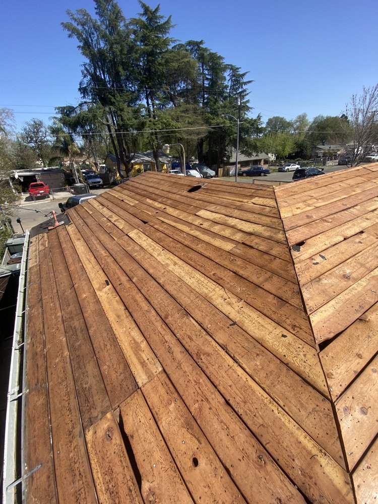 Slide of Samperios Roofing