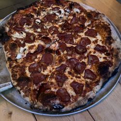 Artista Pizza - half pep, half mushroom and pepperoni pizza