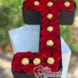 Anny's Flower Shop And Gifts - Letter filled with roses.