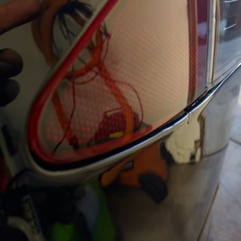 Eddie's Paintless Dent Repair - After EPDR: charge point dent nearly gone! - Mobile Dent Repair Near Me - Round Lake, Illinois Eddie's Paintless Dent Repair - After EPDR: charge point dent nearly gone! - Mobile Dent Repair Near Me - Round Lake, Illinois
