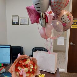 Cutler Bay Flower Shop - Gorgeous! Cutler Bay Flowers: 9 piece Sanrio Hello Kitty balloons + 36 multi colored Roses + Vase. Add delivery & Tax= $180.64. Happy!
