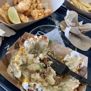 The HUB - Box Tex spud potato with brisket - Sports Bars Near Me - Allen, Texas