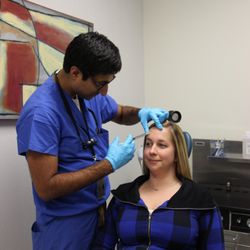 University of Maryland Faculty Physicians in Columbia - Facial Plastic Surgeon, Kalpesh Vakharia, MD, administering Botox.