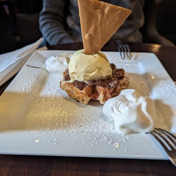 Town Crier Pub - Belgium waffle with vanilla ice cream and Nutella - Pubs Near Me - Toronto, Ontario Town Crier Pub - Belgium waffle with vanilla ice cream and Nutella - Pubs Near Me - Toronto, Ontario
