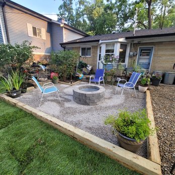 Rogers Tree Service & Landscaping - a patio with a fire pit - Tree Services Near Me Rogers Tree Service & Landscaping - a patio with a fire pit - Tree Services Near Me