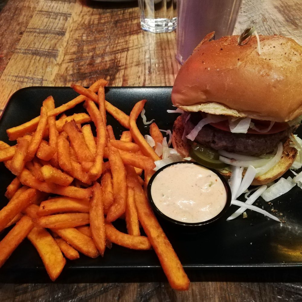 Classic burger on a brioche bun with sweet potato fries ($13) Classic burger on a brioche bun with sweet potato fries ($13)