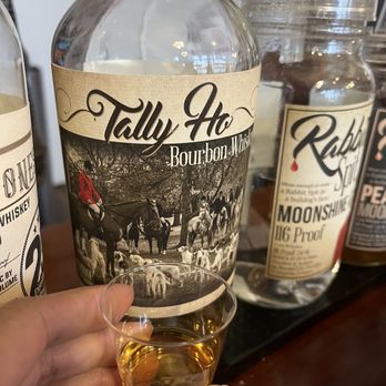 Carolina Moon Distillery - a person holding a glass of whisky - Distilleries Near Me - Edgefield, South Carolina Carolina Moon Distillery - a person holding a glass of whisky - Distilleries Near Me - Edgefield, South Carolina