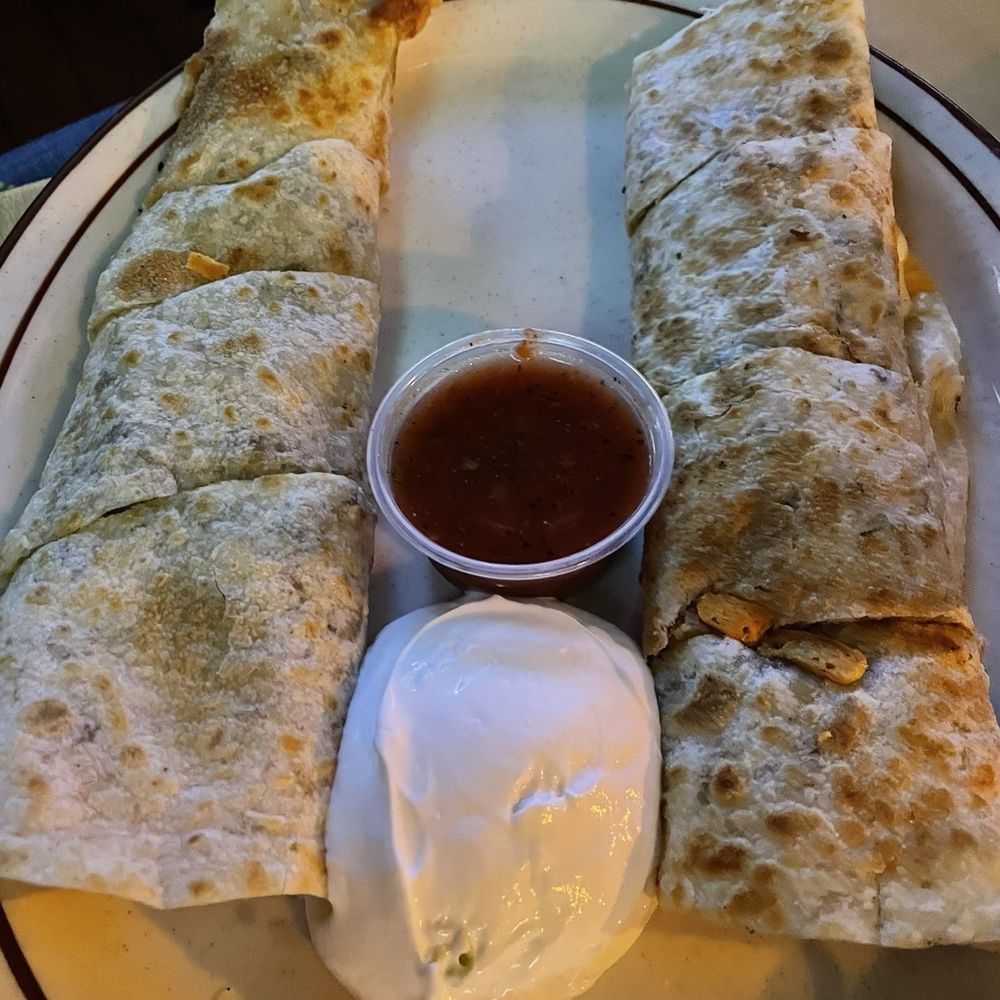 OB's Pub & Grill - Beef quesadilla- generous portions and a red sauce w/a kick. - Sports Bars Near Me - Manhattan Beach, California OB's Pub & Grill - Beef quesadilla- generous portions and a red sauce w/a kick. - Sports Bars Near Me - Manhattan Beach, California