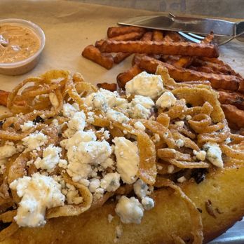 Buckhorn BBQ + Grill - Roadhouse buck with tri-tip, onion strings, blue cheese and a side of sweet potato fries - Barbeque Near Me - Folsom, California
