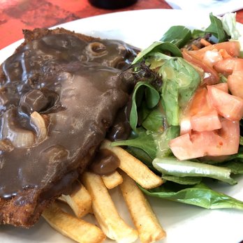 The London Cafe - Pork Schnitzel served with Fries & Salad - Cafes Near Me - Richmond, British Columbia The London Cafe - Pork Schnitzel served with Fries & Salad - Cafes Near Me - Richmond, British Columbia