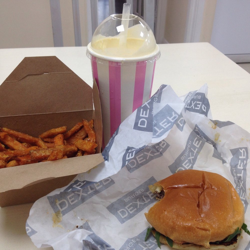 Dexter Burger - Dexters burger with sweet potato fries and Reece's peanut butter milkshake ! So good I couldn't wait to take a bite! - New American Near Me - Purley, XGL