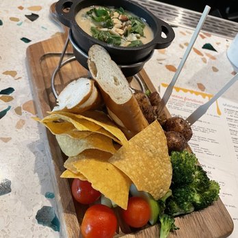 Melting Pot Social - The Monterey Cheese Fondue Appetizer - New American Near Me - Tampa, Florida Melting Pot Social - The Monterey Cheese Fondue Appetizer - New American Near Me - Tampa, Florida