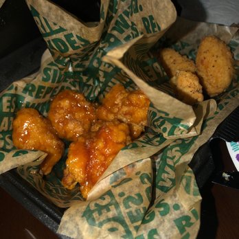 Wingstop - a tray of fried food on a table - Chicken Wings Near Me - Windsor, California
