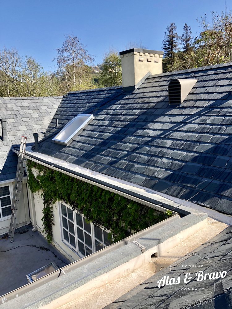 Slide of Alas & Bravo Roofing Company