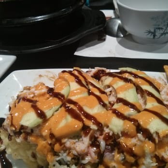 Mansun Sushi - Man sun roll. Seems like huge tempurad cali rolls wit avocados, squid, n sauce on top. Also jus ok - Japanese Near Me - Walnut, California