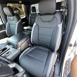 The Prestige Companies Auto Upholstery - 2019 Ford Raptor leather upholstery upgrade using an OEM matched Alea Leather kit.