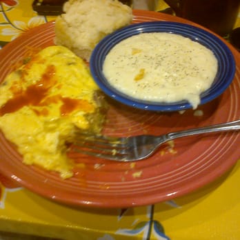 The Flying Biscuit Cafe - Piedmont omelet with house special grits and buscuit. - New American Near Me - Gainesville, Florida The Flying Biscuit Cafe - Piedmont omelet with house special grits and buscuit. - New American Near Me - Gainesville, Florida