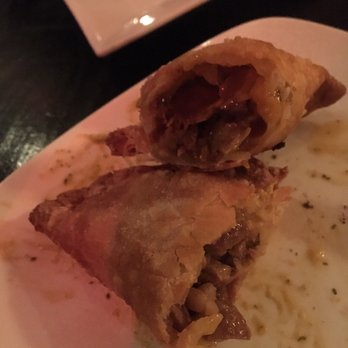 Cravings Tapas Bistro - Inside the cheese steak empanada - Tapas/Small Plates Near Me - Ridgewood, New Jersey Cravings Tapas Bistro - Inside the cheese steak empanada - Tapas/Small Plates Near Me - Ridgewood, New Jersey