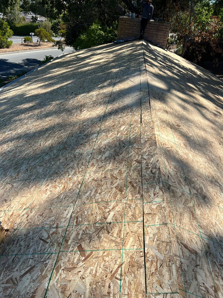 Slide of Roofin Services