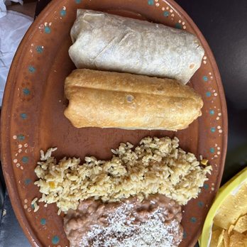 Eduardo's Lokos Tacos - Combo plate - mini burrito beef and chimichanga comes with rice and beans. - Mexican Near Me - Tavares, Florida Eduardo's Lokos Tacos - Combo plate - mini burrito beef and chimichanga comes with rice and beans. - Mexican Near Me - Tavares, Florida
